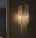 Creative fashion tassel post-modern simple living room light luxury clothing store corridor bedroom bed Nordic art wall lamp